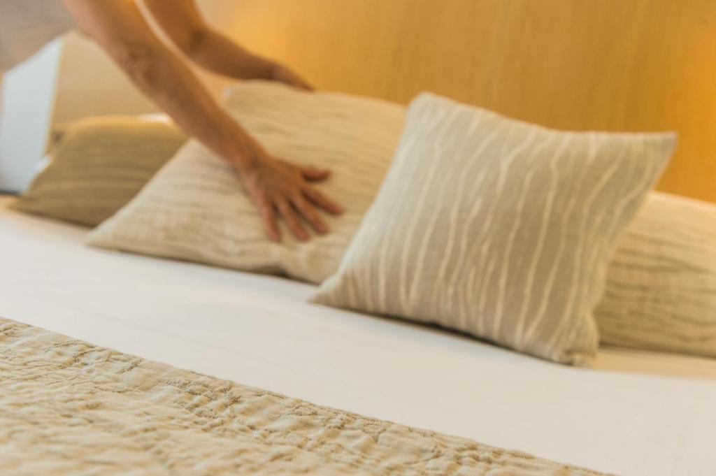 Posteľ alebo postele v izbe v ubytovaní Mitico Hotel & Natural Spa