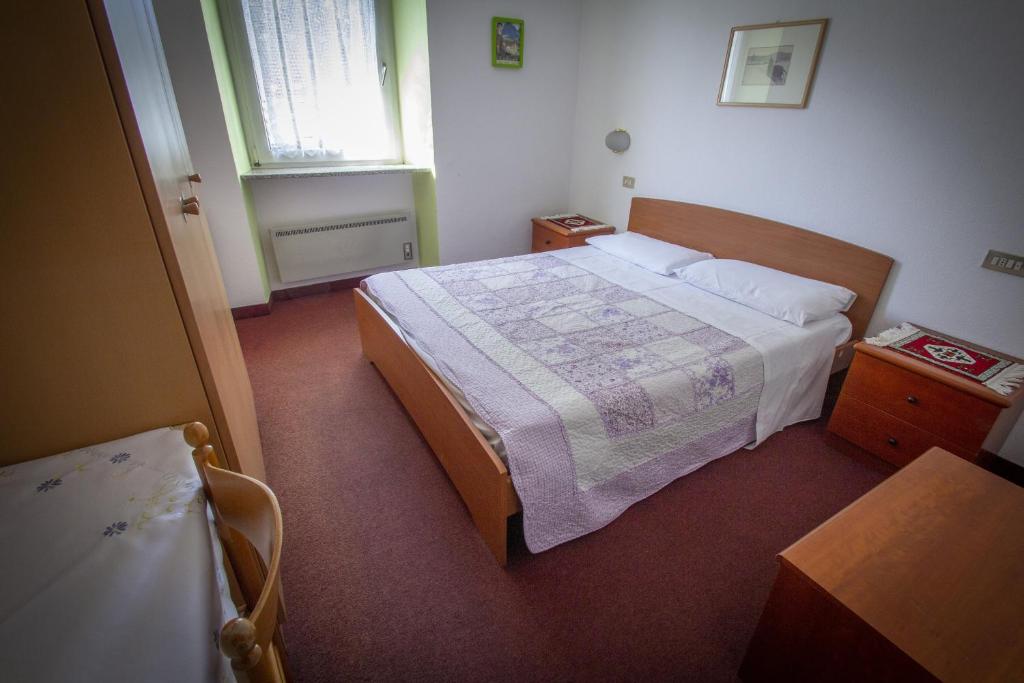 Postel nebo postele na pokoji v ubytování Albergo Stella