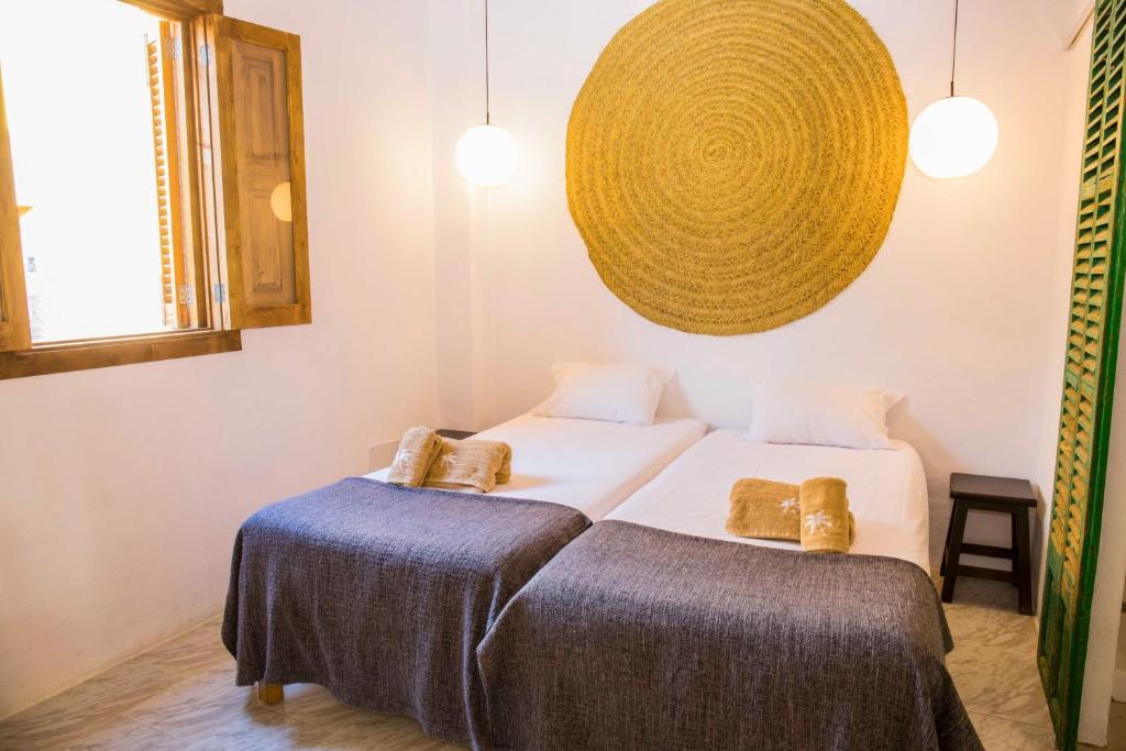 A bed or beds in a room at Villa Sant Josep