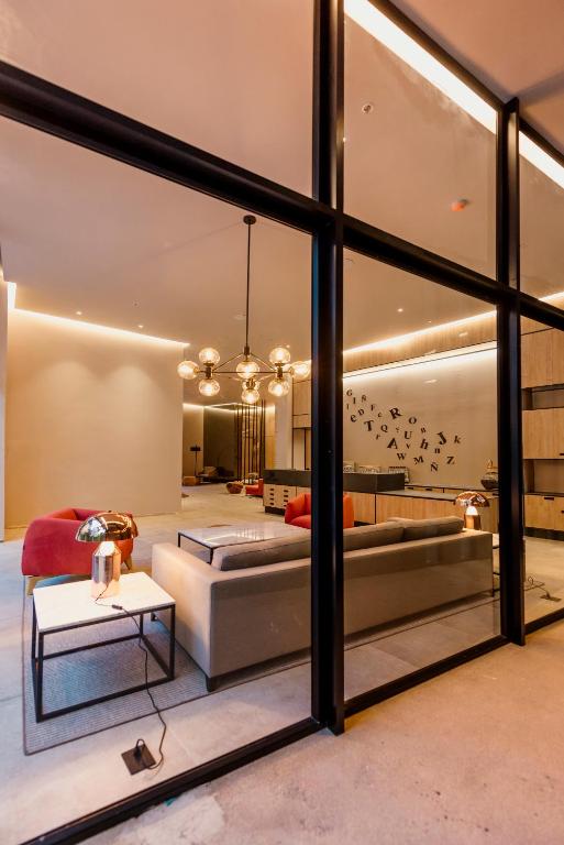 Postel nebo postele na pokoji v ubytování Lettera Hotel