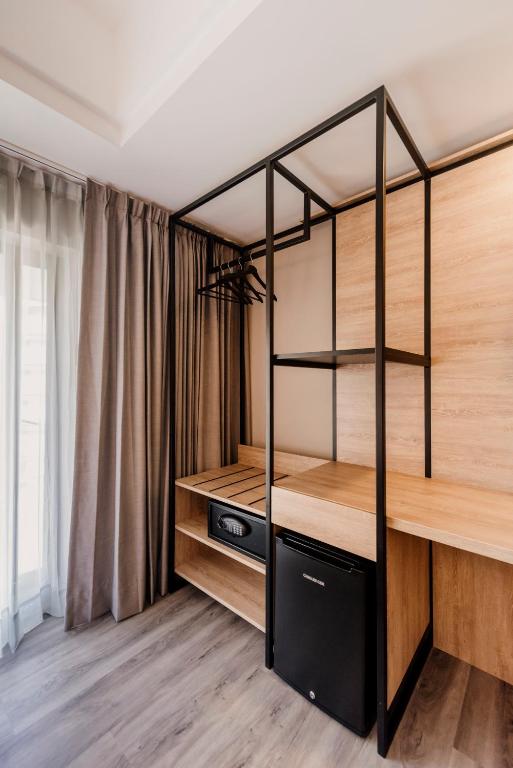 Postel nebo postele na pokoji v ubytování Lettera Hotel