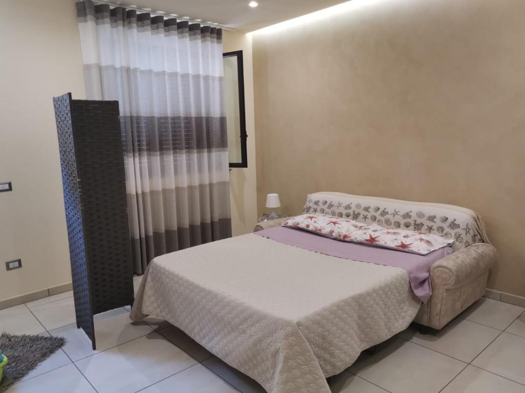 Postel nebo postele na pokoji v ubytování Sea Paradise