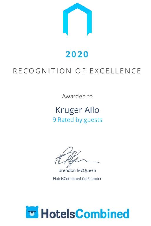 Un certificado, premio, letrero u otro documento en Kruger Allo B&B