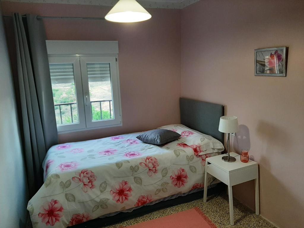 Postel nebo postele na pokoji v ubytování Casa rural "Garnacha de Borja" guest home