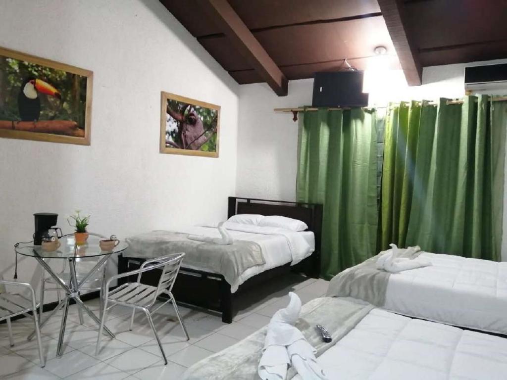 Casona del Valle tesisinde bir odada yatak veya yataklar