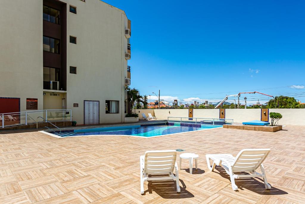  Apto completo com piscinas a 50 m do Mar