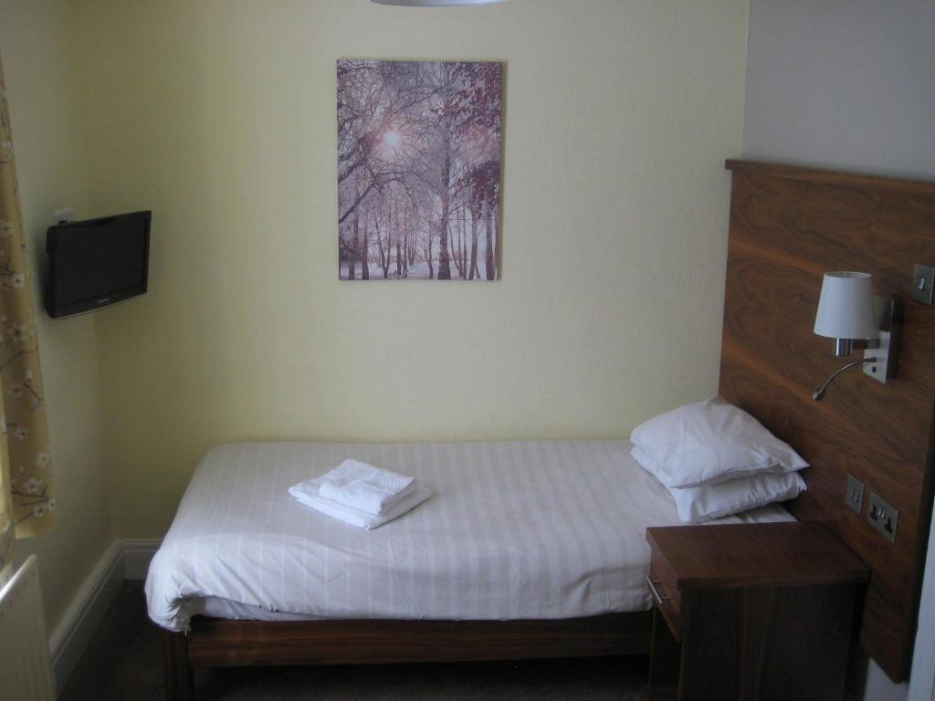 Postel nebo postele na pokoji v ubytování Wheatlands Lodge Hotel