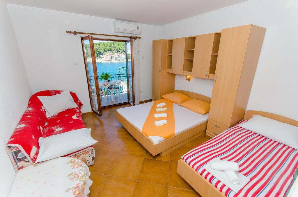 Posteľ alebo postele v izbe v ubytovaní Apartments Moloco