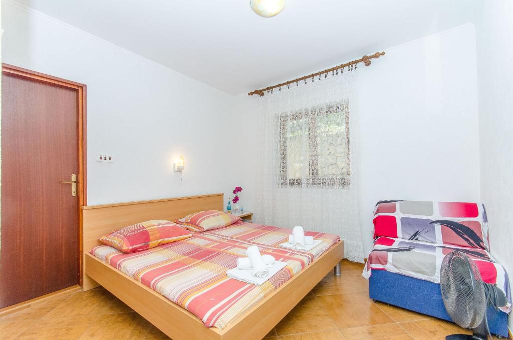 Posteľ alebo postele v izbe v ubytovaní Apartments Moloco