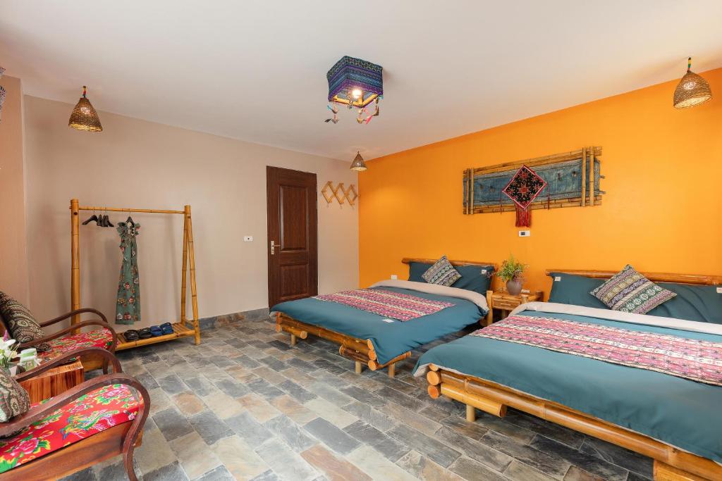 Postel nebo postele na pokoji v ubytování Mega View Homestay