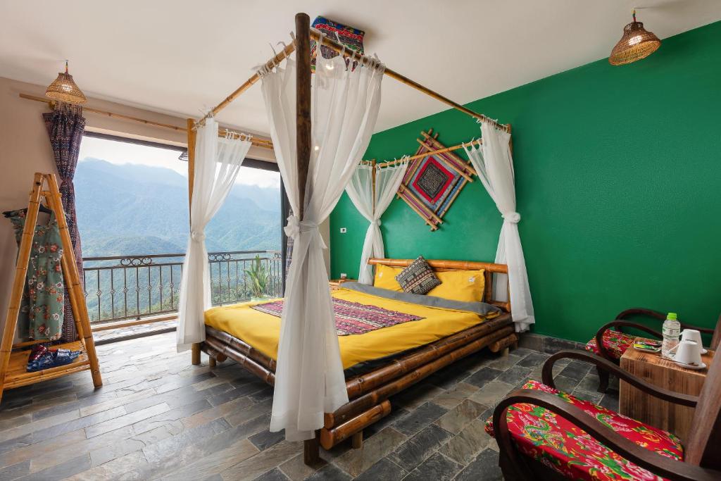 Postel nebo postele na pokoji v ubytování Mega View Homestay