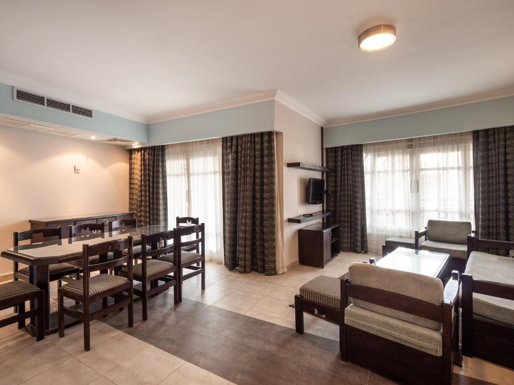 Postel nebo postele na pokoji v ubytování Sunny Days Mirette Family Resort