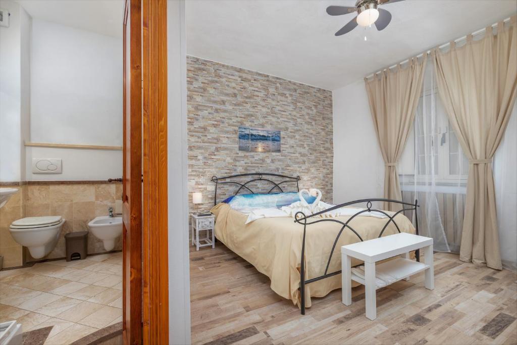 A bed or beds in a room at B&B Maremma's dream