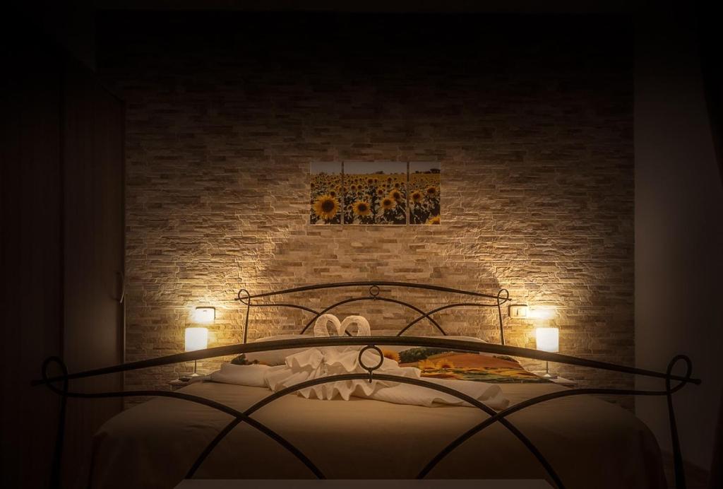 A bed or beds in a room at B&B Maremma's dream