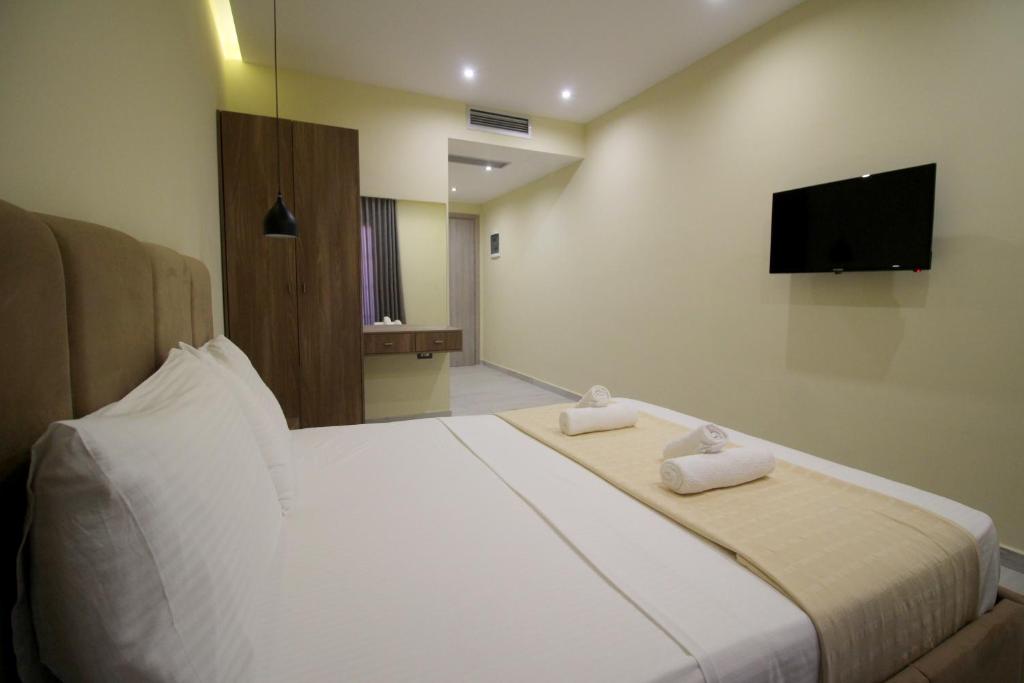 Postel nebo postele na pokoji v ubytování Hotel Sunway