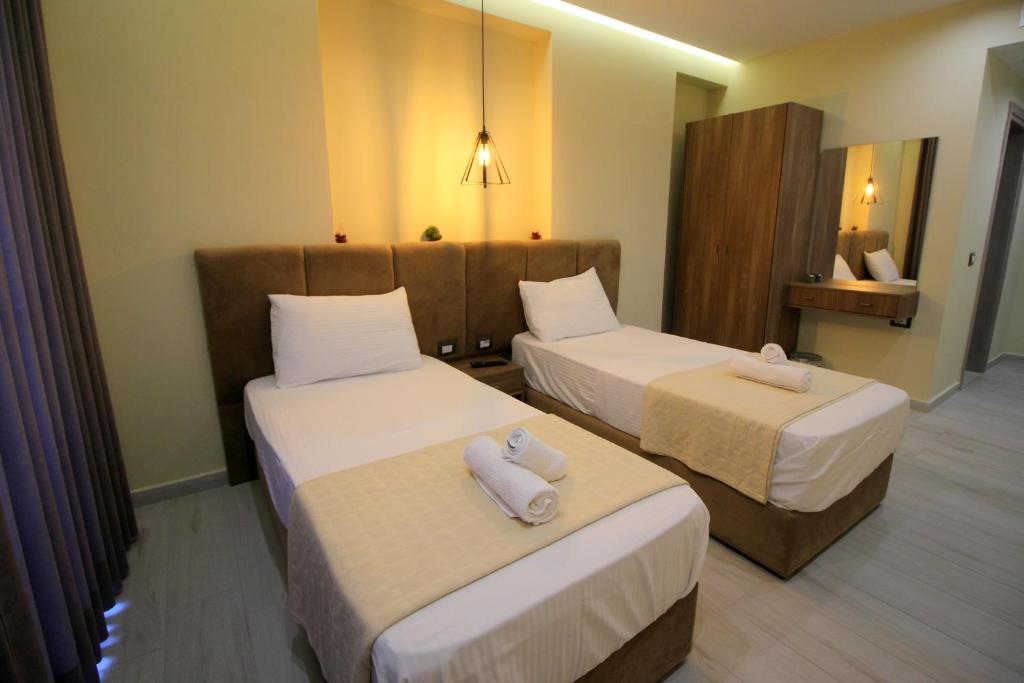 Postel nebo postele na pokoji v ubytování Hotel Sunway