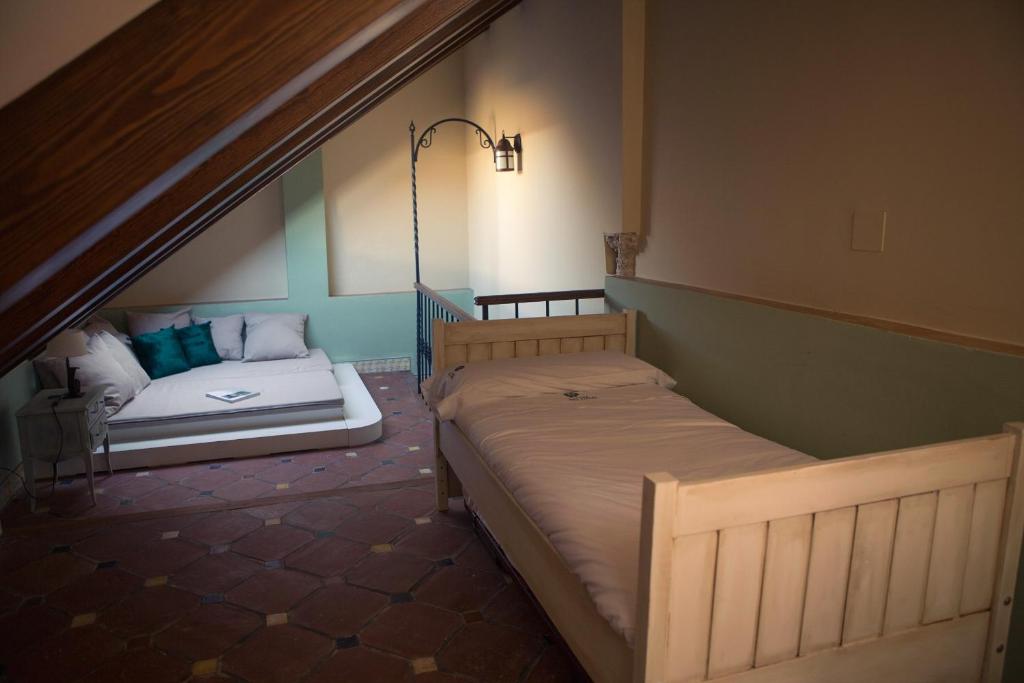 Posteľ alebo postele v izbe v ubytovaní La casa del Cipres una casa con historia