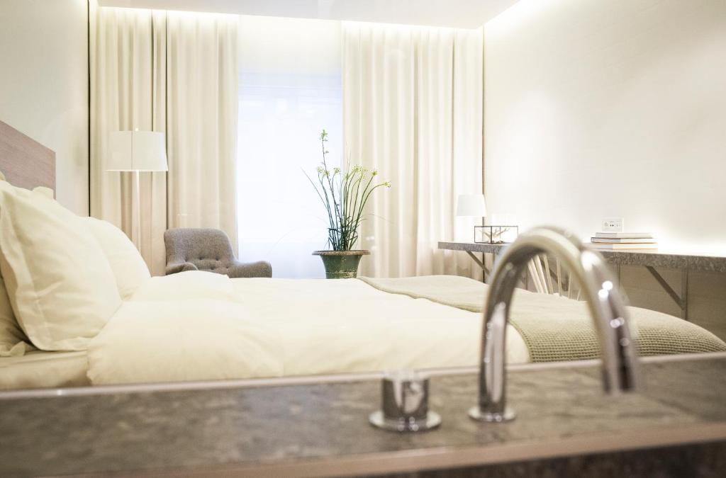 Postel nebo postele na pokoji v ubytování PM & Vänner Hotel
