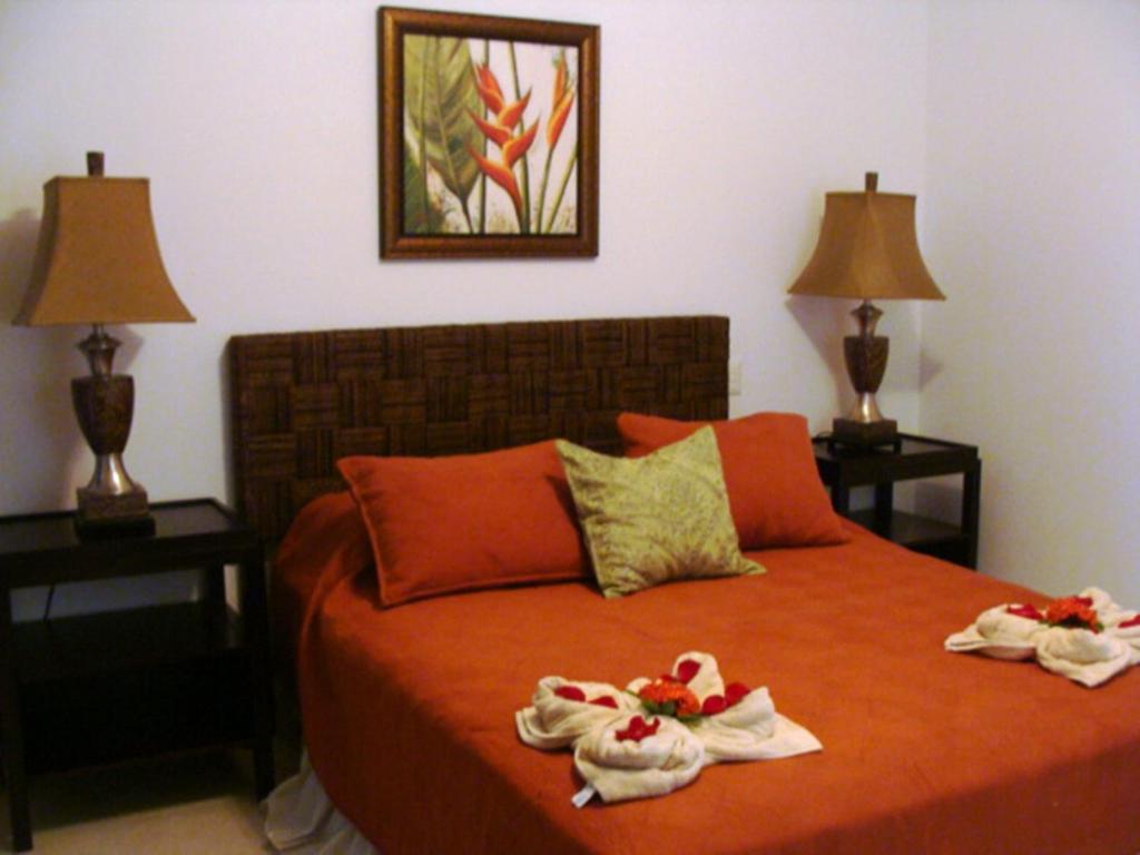 Postel nebo postele na pokoji v ubytování Casa del Sol -Villas Catalinas