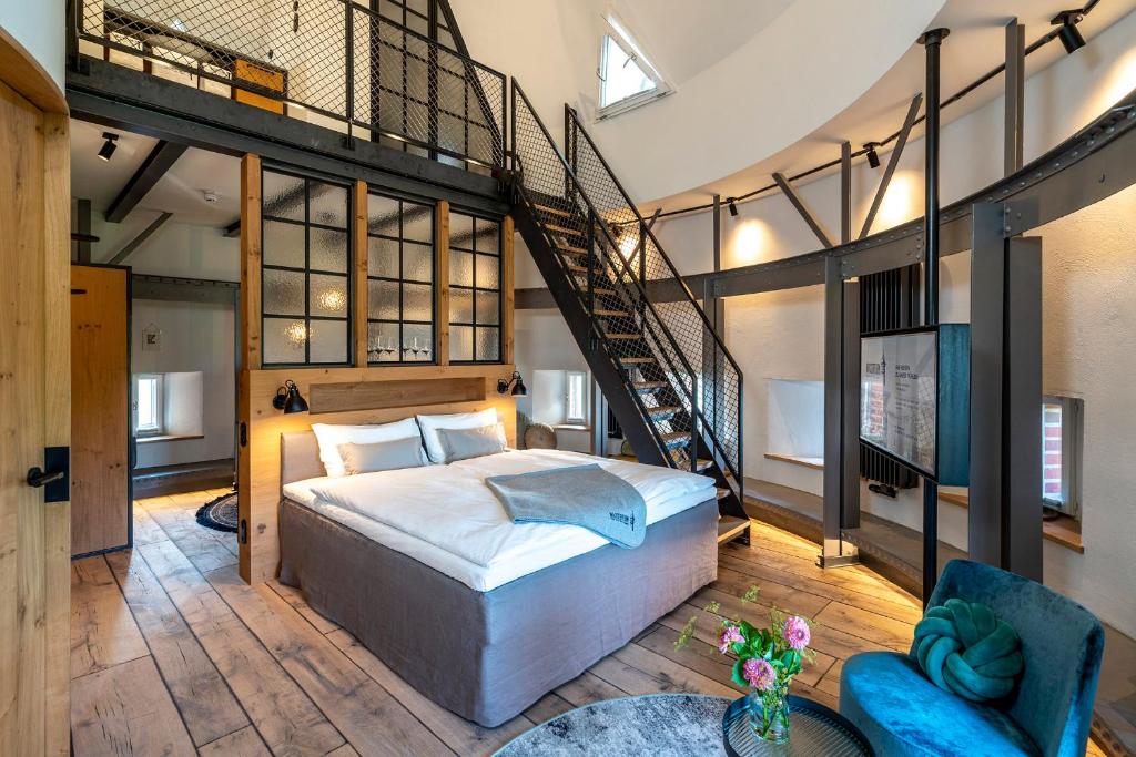 Postel nebo postele na pokoji v ubytování Apart Hotel Wasserturm