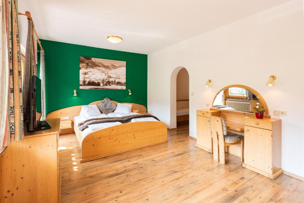 Postel nebo postele na pokoji v ubytování Hotel Guesthouse Dalnig