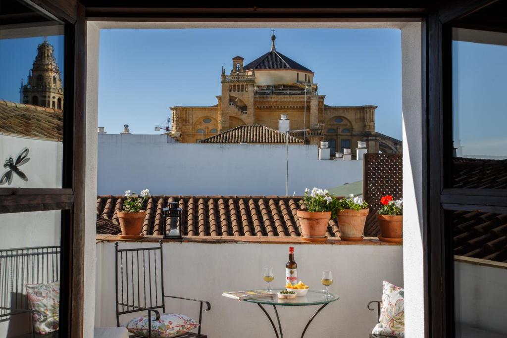 Balkón nebo terasa v ubytování Apartamentos Los Patios de la Judería