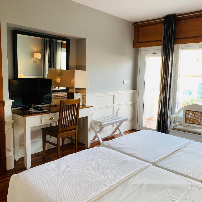 Posteľ alebo postele v izbe v ubytovaní Hotel Vostra Llar