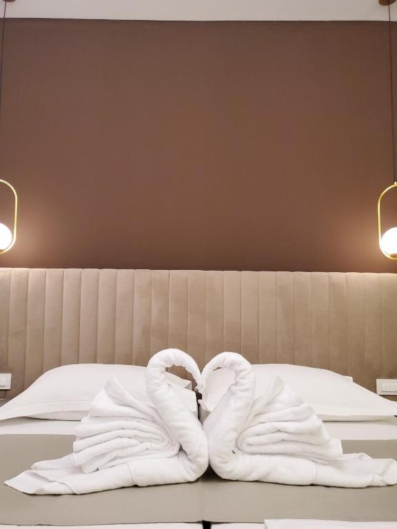Bošket Luxury Rooms房間的床