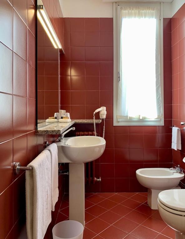 Koupelna v ubytování Hotel Brescia