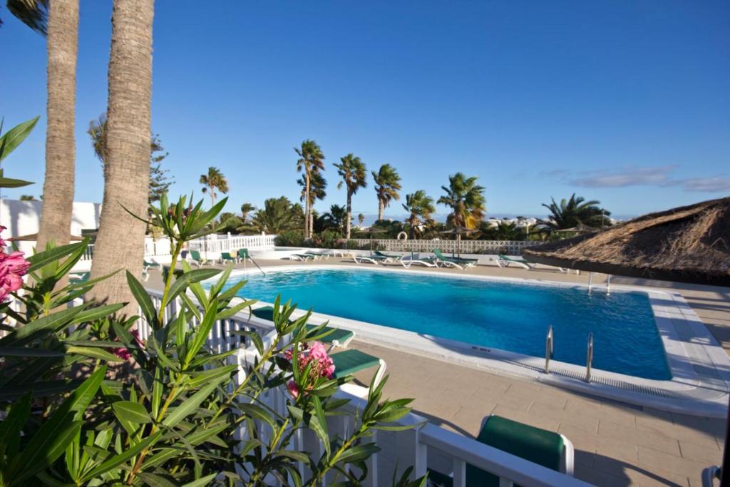 Bazén v ubytování Club Valena 48 Sea Views, Wifi, close to beach & amenities at Matagorda nebo v jeho okolí