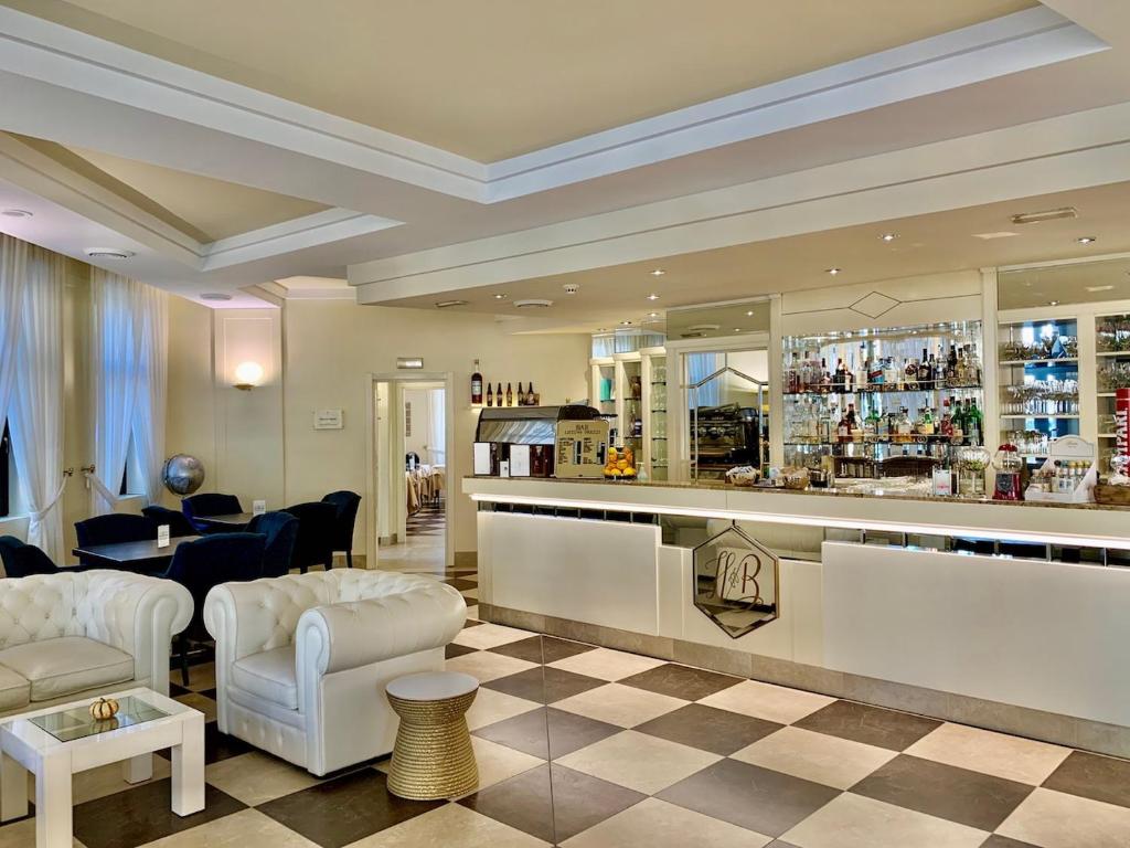 Lounge nebo bar v ubytování Hotel Brescia