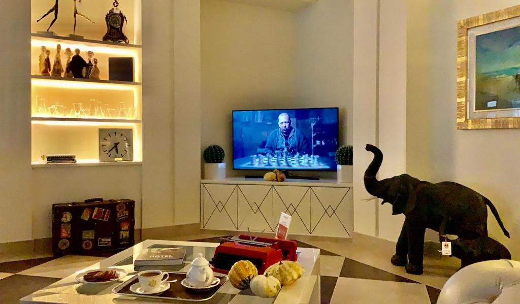 TV a/nebo společenská místnost v ubytování Hotel Brescia
