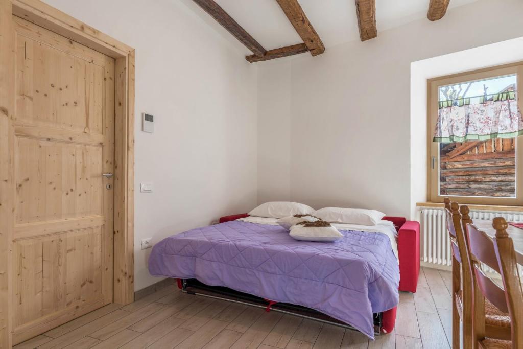 Postel nebo postele na pokoji v ubytování Casa di Ada