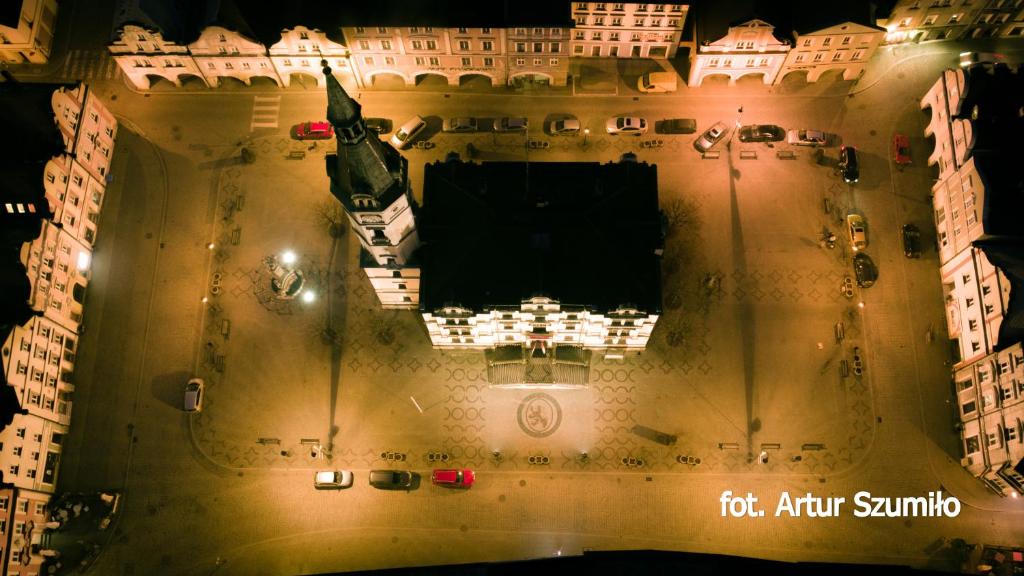 an aerial view of a city at night at Kościuszki 3 Apartamenty in Lądek-Zdrój