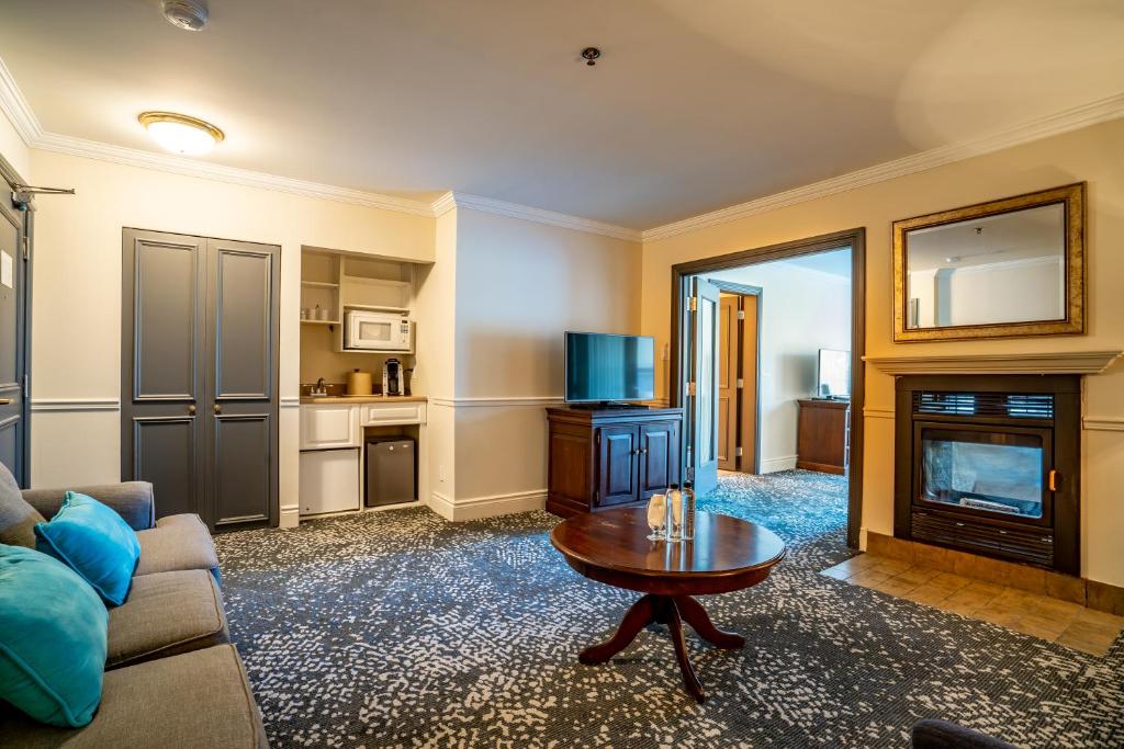 Kuchyň nebo kuchyňský kout v ubytování Manoir des Sables Hôtel & Golf