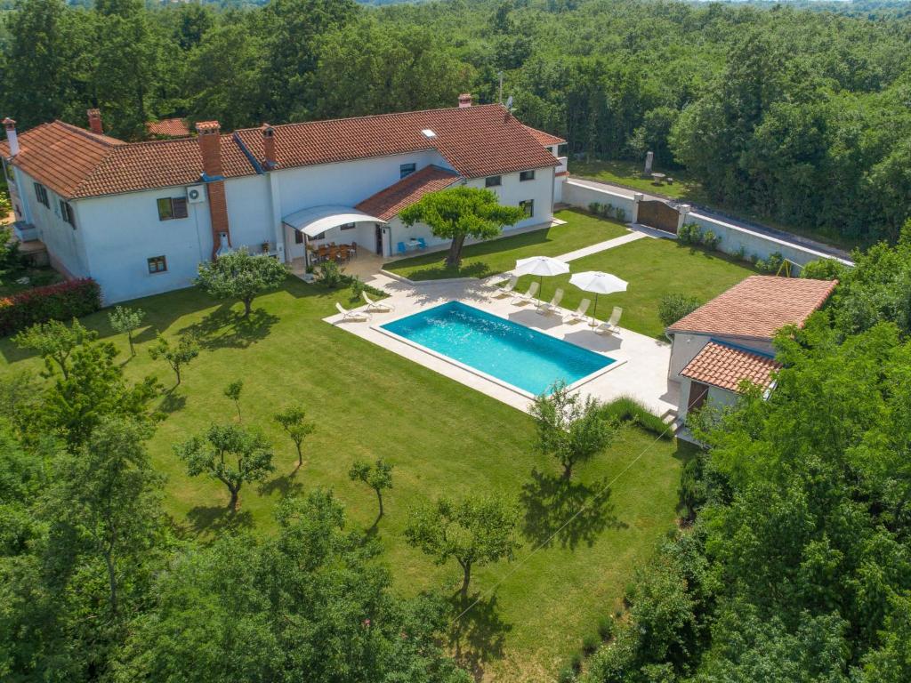 an aerial view of a house with a swimming pool at Holiday Home Tijan - ROJ411 by Interhome in Žminj
