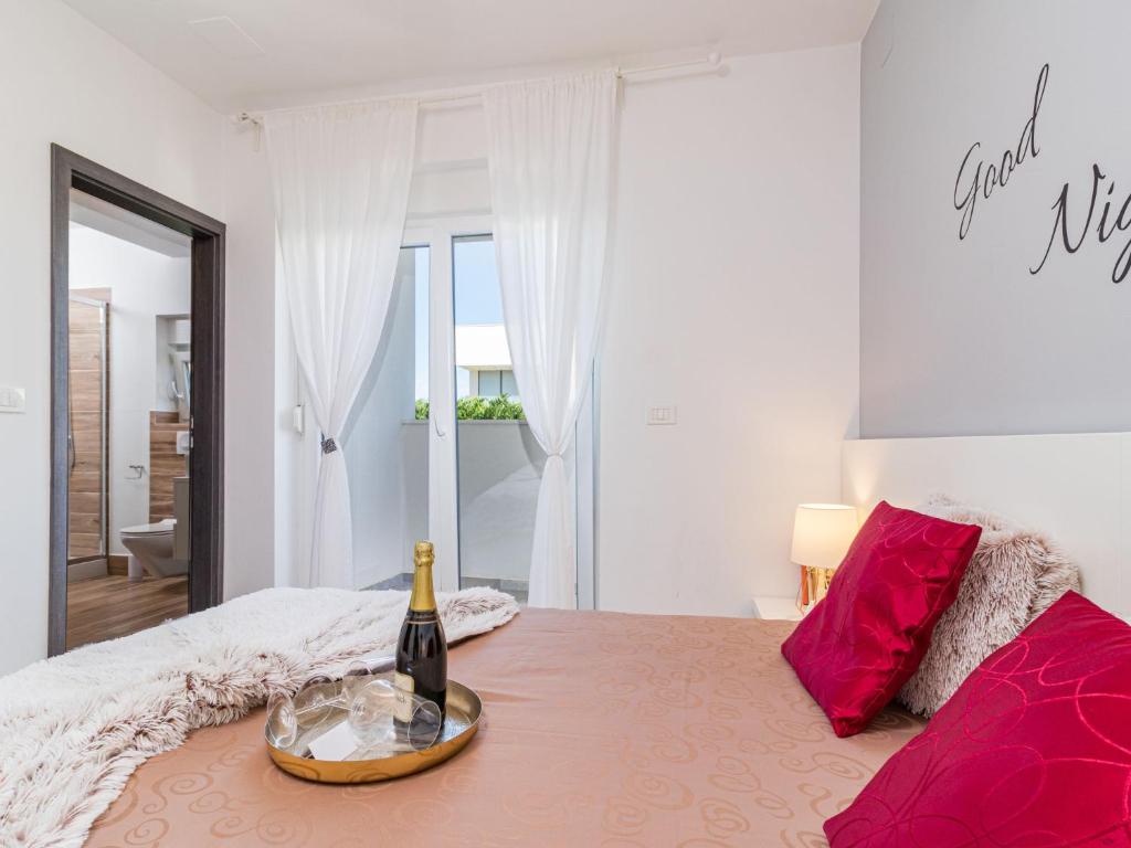 Łóżko lub łóżka w pokoju w obiekcie Holiday Home Villa Virtus by Interhome