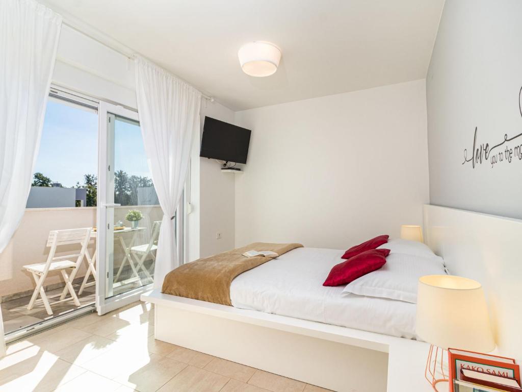 Łóżko lub łóżka w pokoju w obiekcie Holiday Home Villa Virtus by Interhome