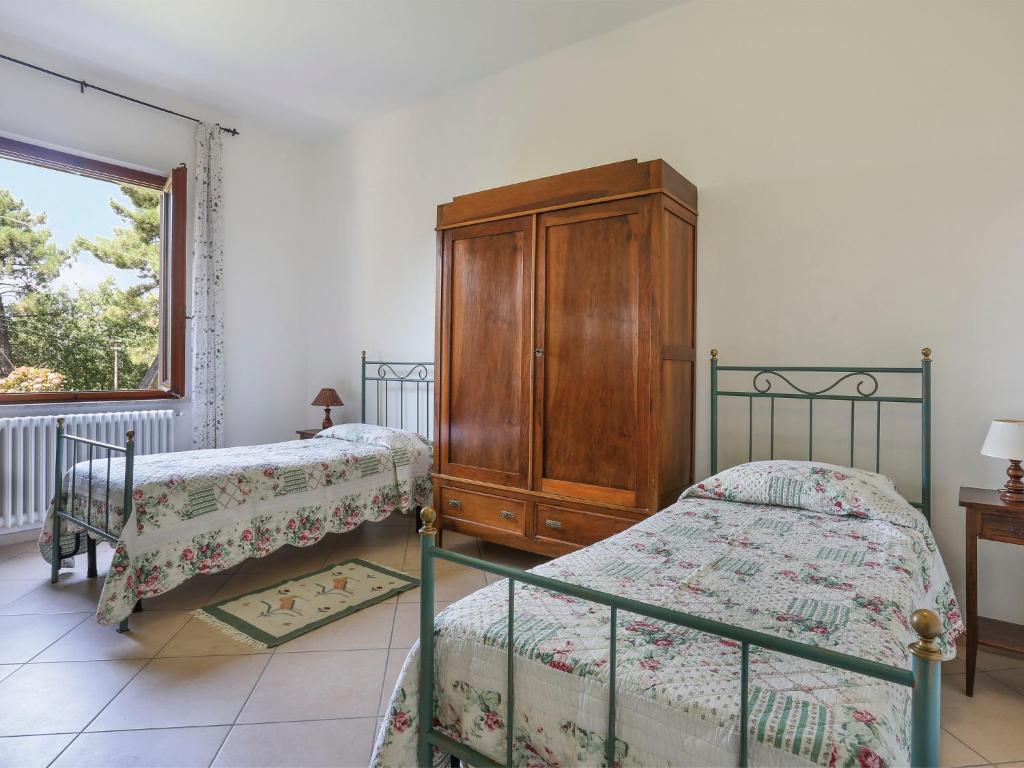 Posteľ alebo postele v izbe v ubytovaní Holiday Home Le Castagne by Interhome