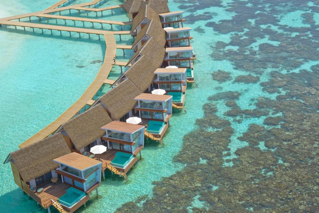 an overhead view of a resort in the water at Kandolhu Maldives in Himandhoo 
