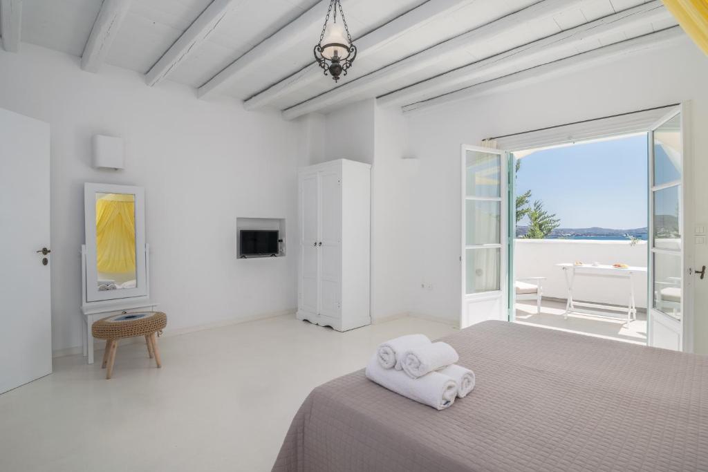 Postel nebo postele na pokoji v ubytování Thalassitra Private Pool Suites