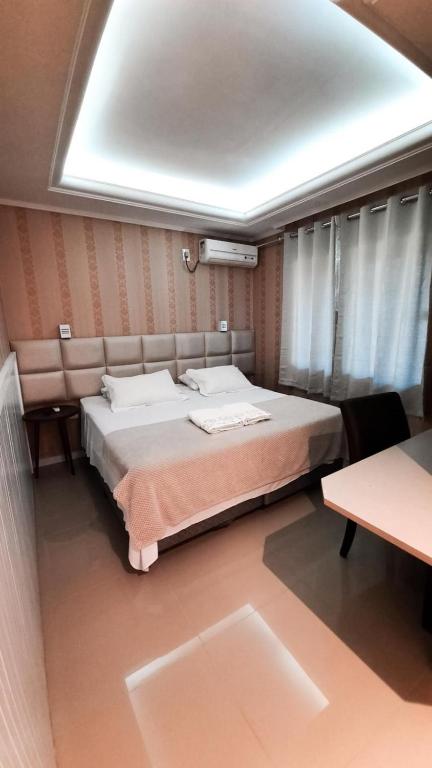 Postel nebo postele na pokoji v ubytování Pousada Bela By Bia