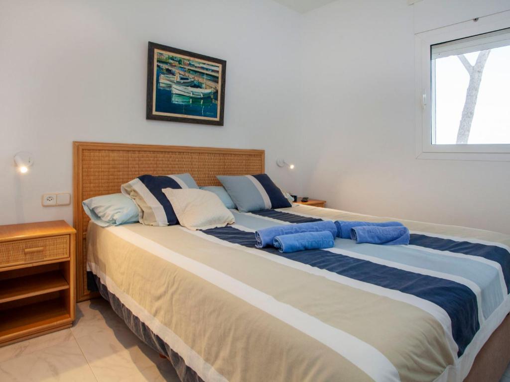Postel nebo postele na pokoji v ubytování Holiday Home Trebol Blanco by Interhome