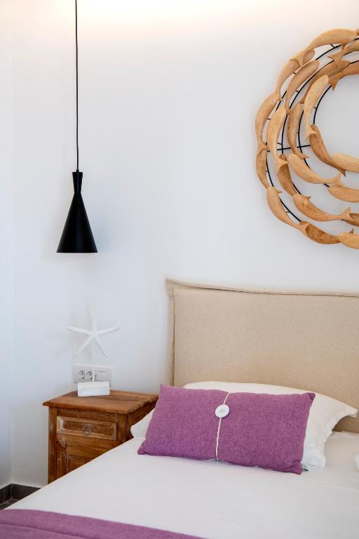 Łóżko lub łóżka w pokoju w obiekcie Corina Studios-Apartments