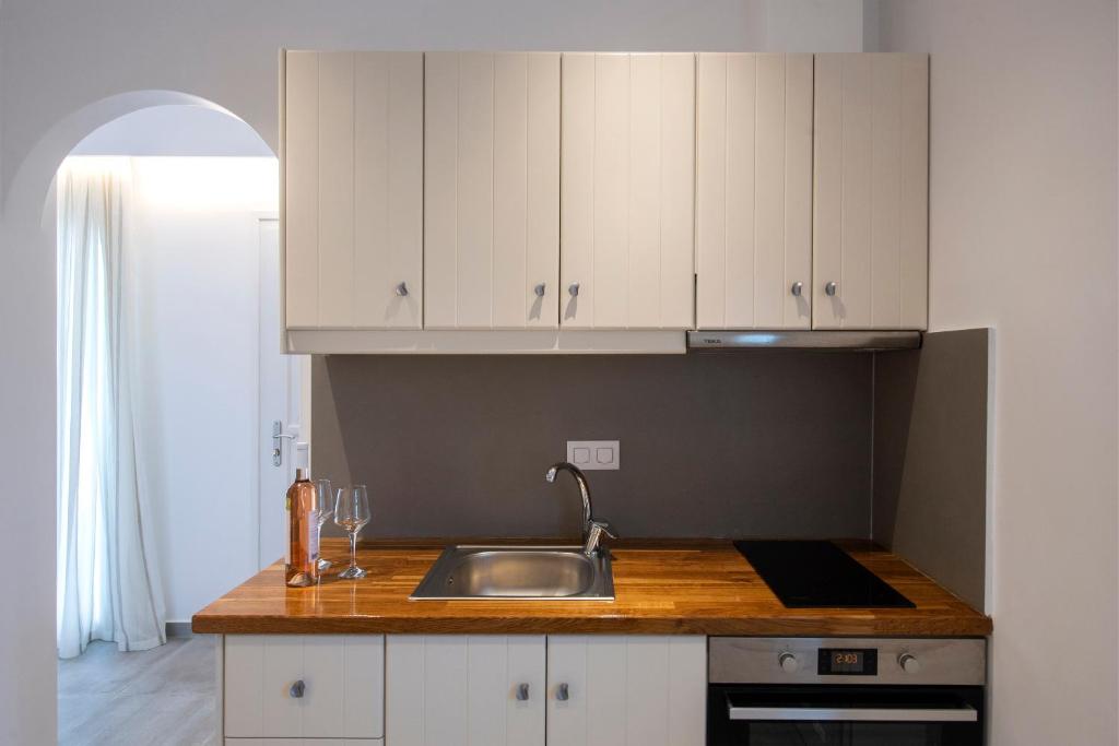 Kuchnia lub aneks kuchenny w obiekcie Corina Studios-Apartments