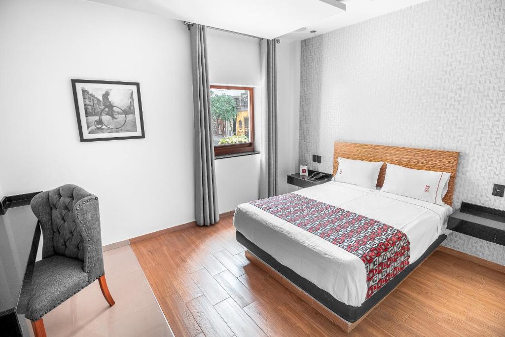 Postel nebo postele na pokoji v ubytování Six Hotel Guadalajara Expiatorio