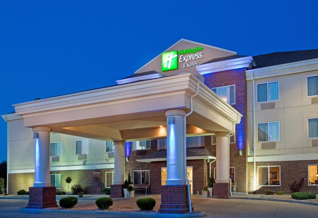 a hotel with a gazebo in front of a building at Holiday Inn Express & Suites - Dickinson, an IHG Hotel in Dickinson