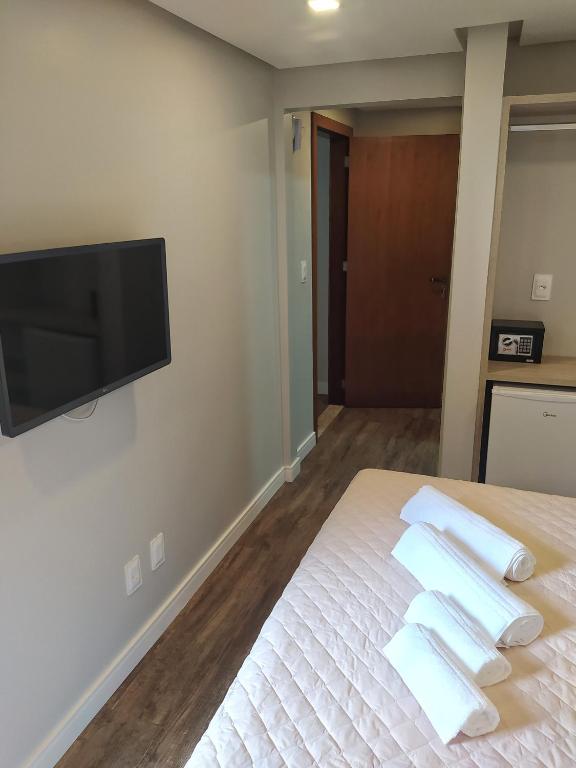 Uma cama ou camas num quarto em Pousada Vila Dos Mares