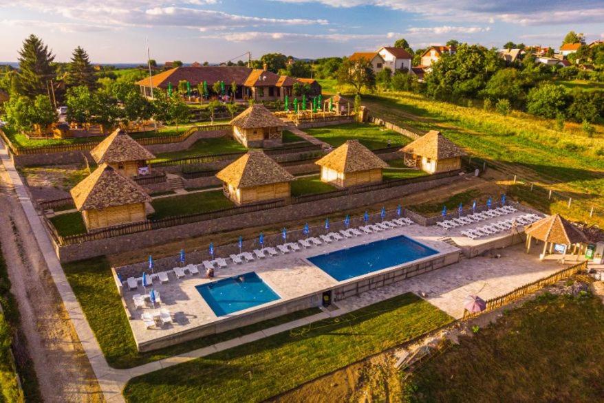 an aerial view of a resort with two swimming pools at Etno selo Azbuka in TrÅ¡iÄ‡