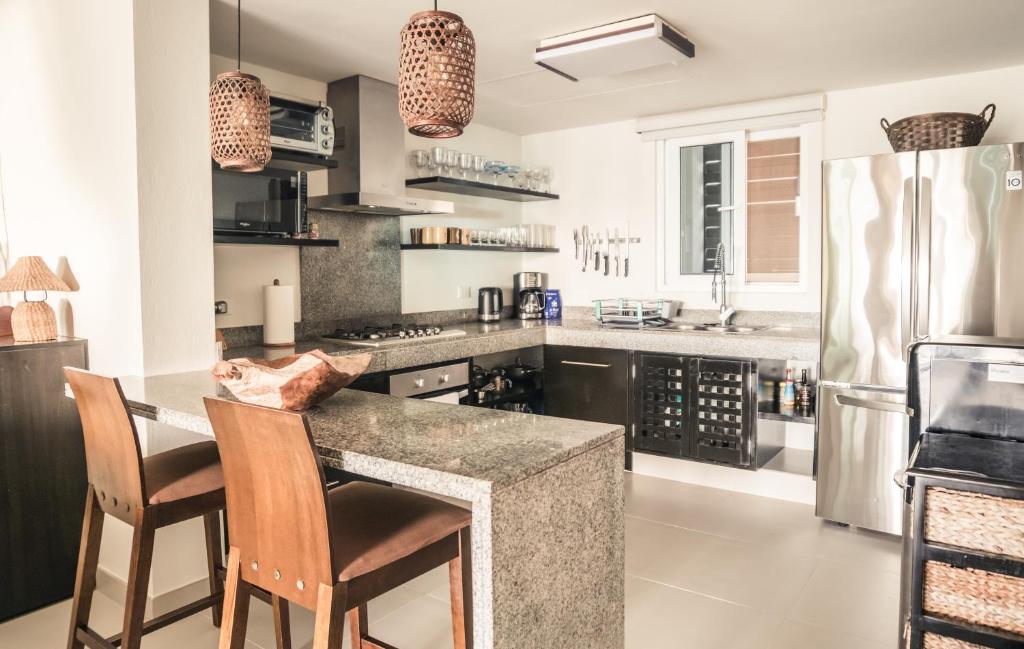 Kuchyň nebo kuchyňský kout v ubytování Casa Brisa y Mar